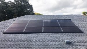 Solar panels flashed to roof